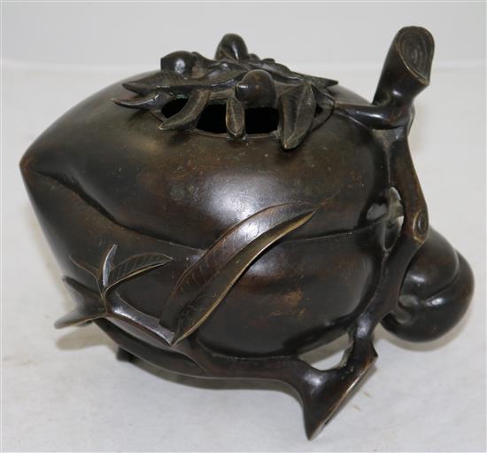 A large Chinese bronze peach-shaped censer and cover, 17th/18th century, height 17.5cm, length 21cm